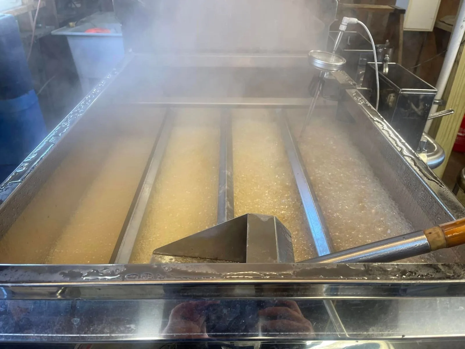 Maple sap boiling in the evaporator pan